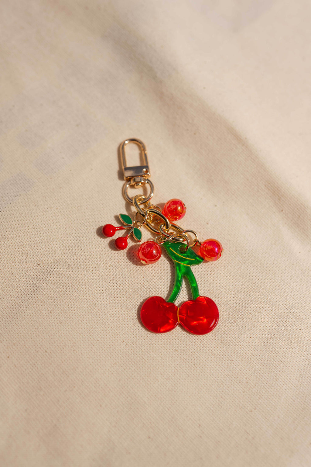 Porte clé Cherry - doré