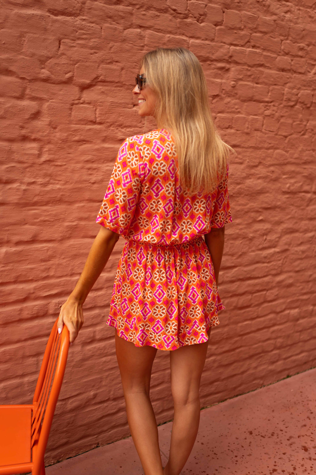 Chelsea romper - orange patterned