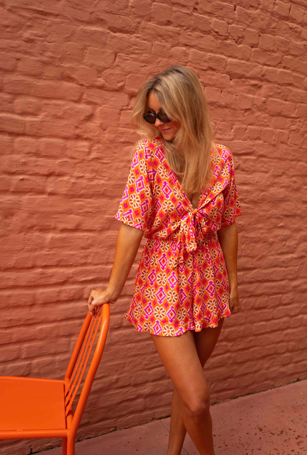 Chelsea romper - orange patterned