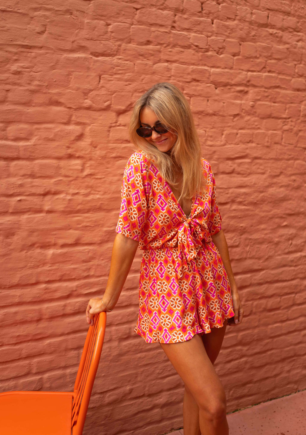 Chelsea romper - orange patterned